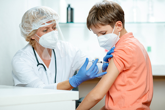 Child receiving vaccine